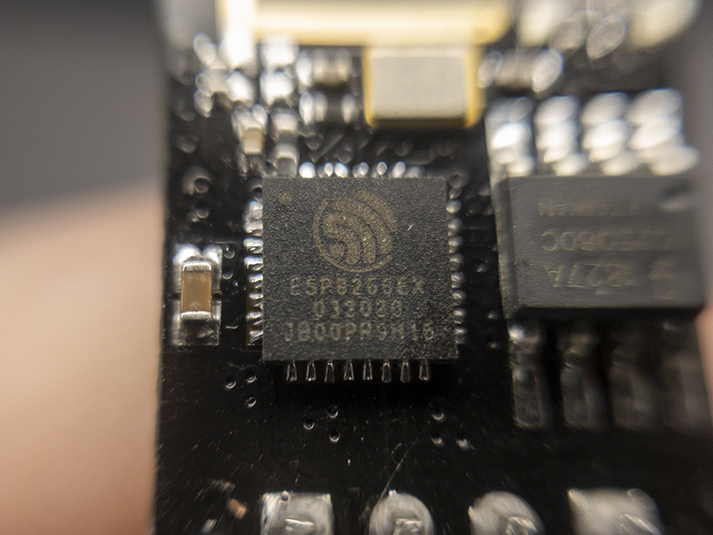 Close-up of the ESP8266 chip on the ESP-01 module